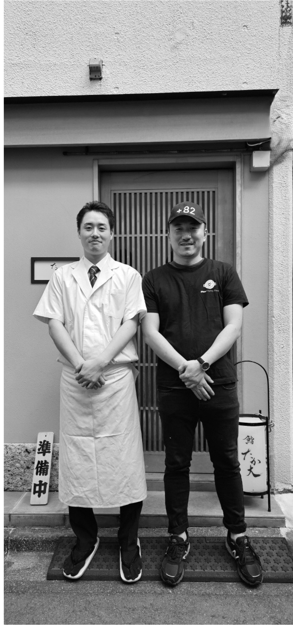The team outside a ramen shop in Tokyo